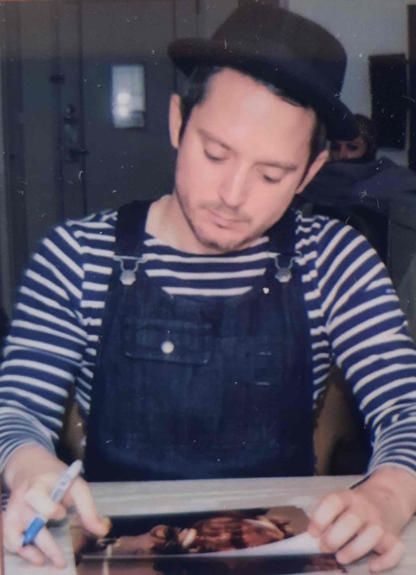 Elijah Wood signe une photo du film Le seigneur des anneaux + cadre .