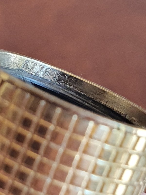 Stylo Louis Vuitton cuir et argent.