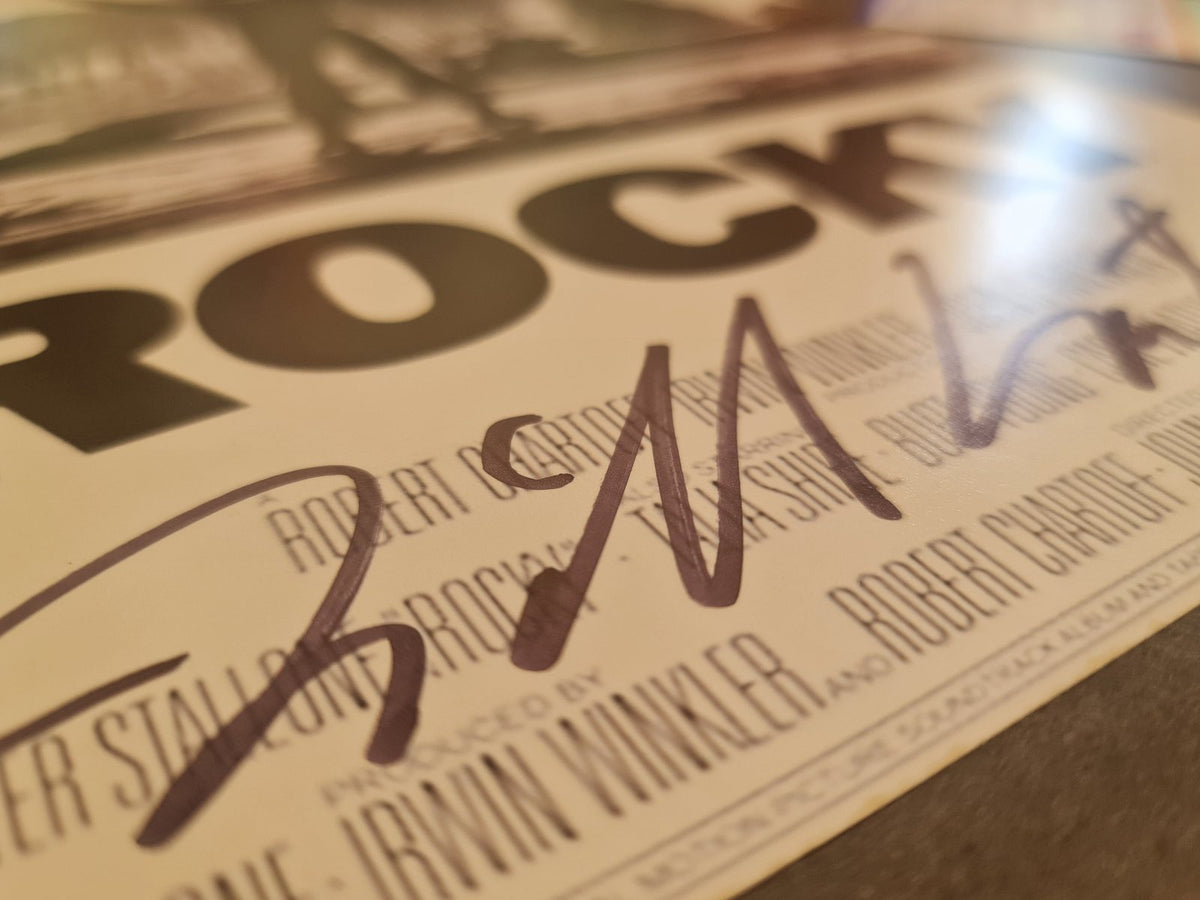 Photo affiche Rocky signée par le compositeur Bill Conti. PSA