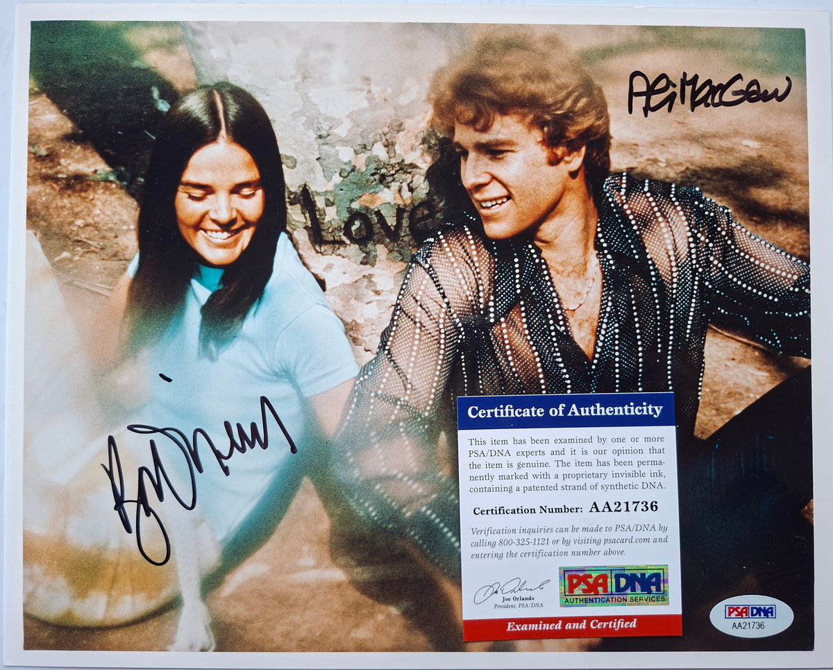 Love Story - Ali MacGraw et Ryan O'Neal autographs PSA