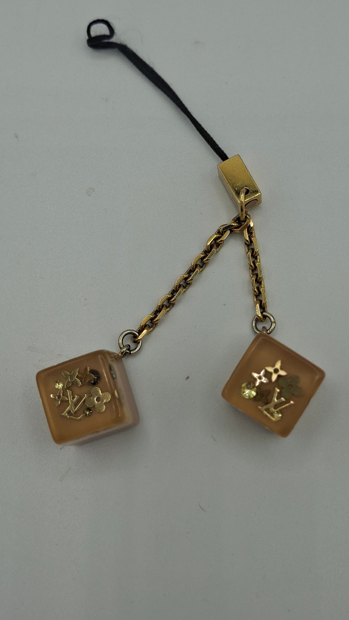 Bijou de sac Louis Vuitton deux dés
