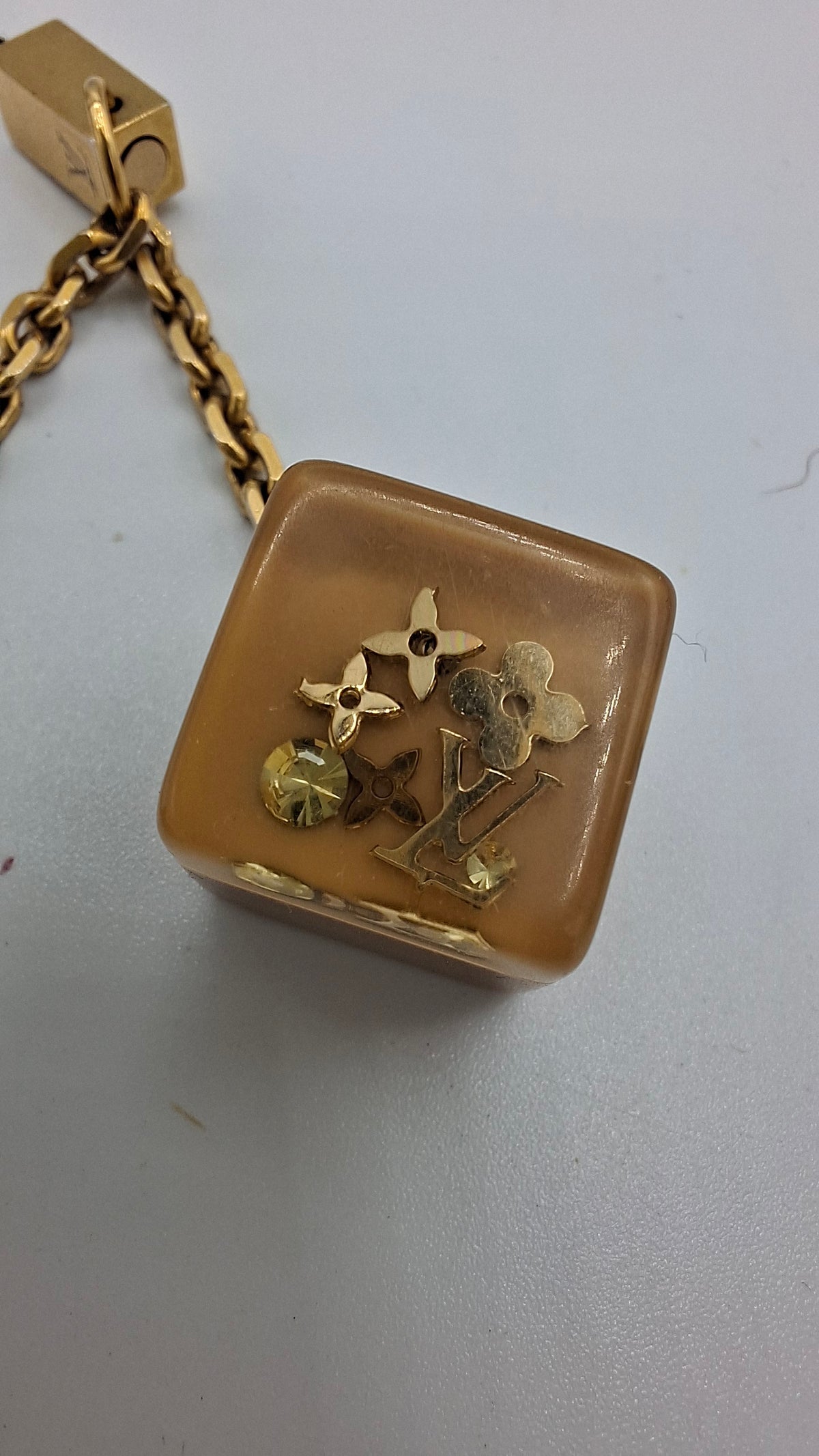 Bijou de sac Louis Vuitton deux dés
