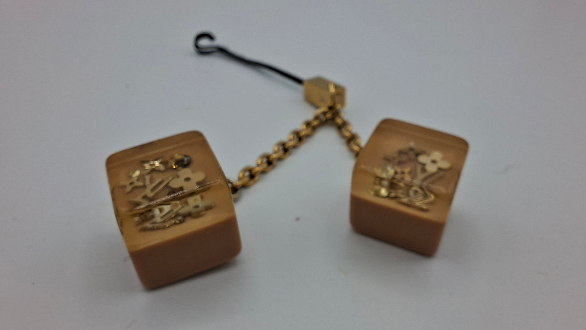 Bijou de sac Louis Vuitton deux dés