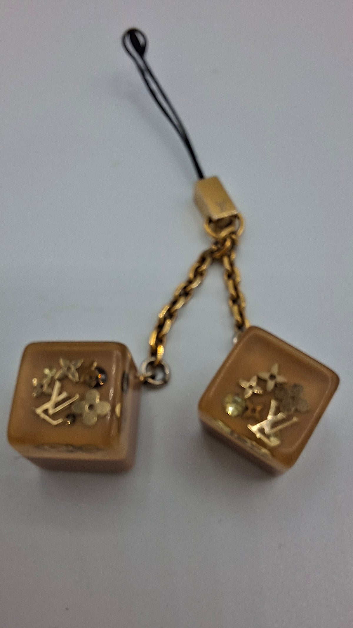 Bijou de sac Louis Vuitton deux dés