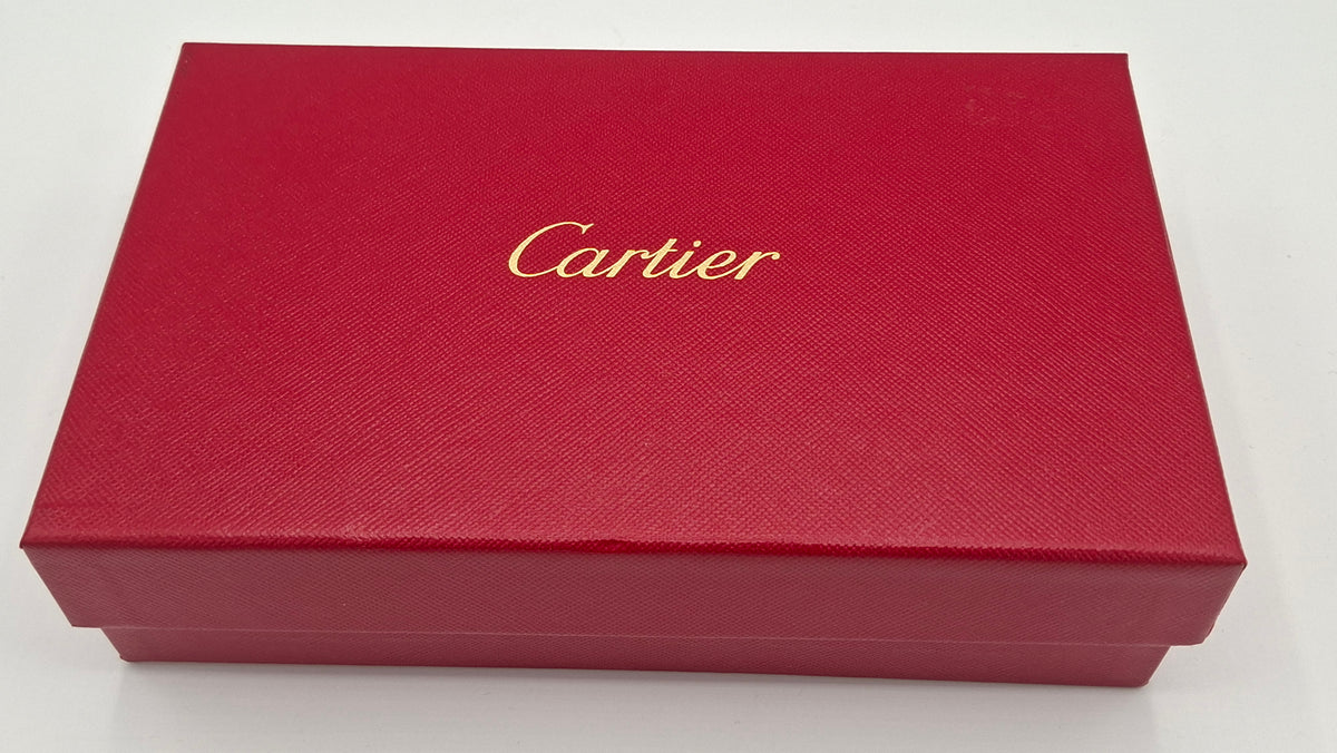 Portefeuille femme Cartier en cuir avec boite et accessoires