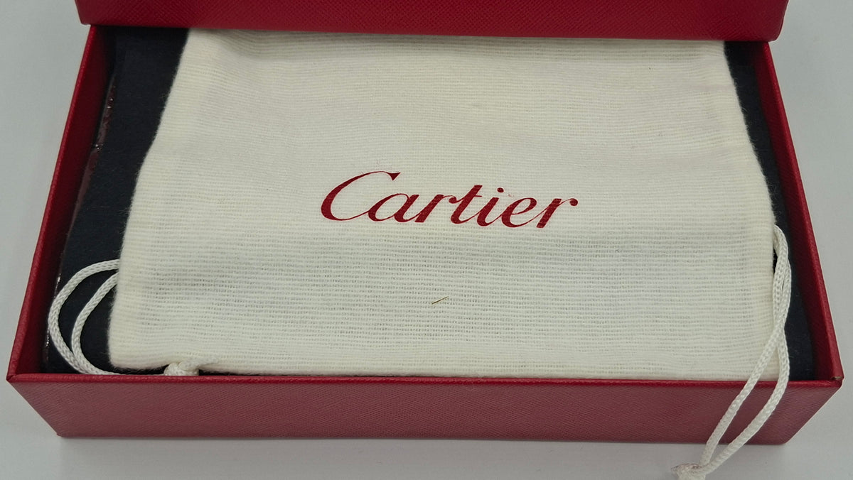 Portefeuille femme Cartier en cuir avec boite et accessoires