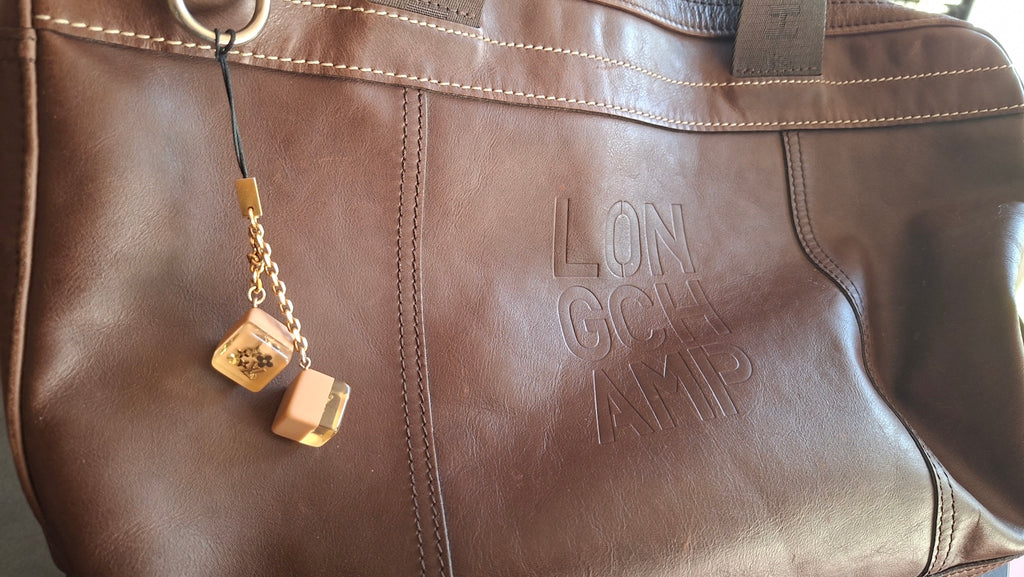 Bijou de sac Louis Vuitton deux dés