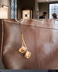 Bijou de sac Louis Vuitton deux dés