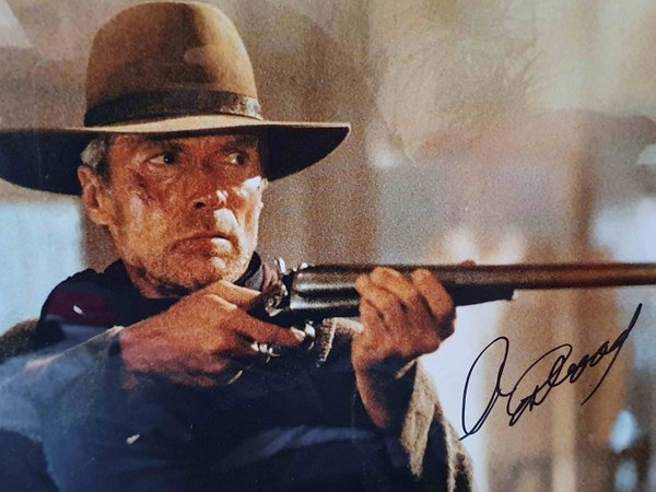 Autographe de Clint Eastwood sur une photo tirée du film Impitoyable.