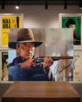 Autographe de Clint Eastwood sur une photo tirée du film Impitoyable.