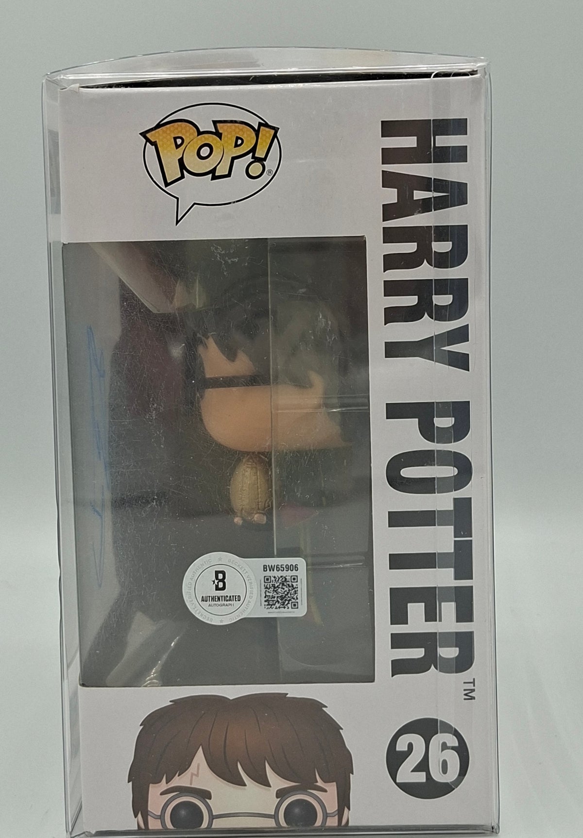 Autographe de Daniel Radcliffe sur Funko Pop 26 Harry Potter. Beckett