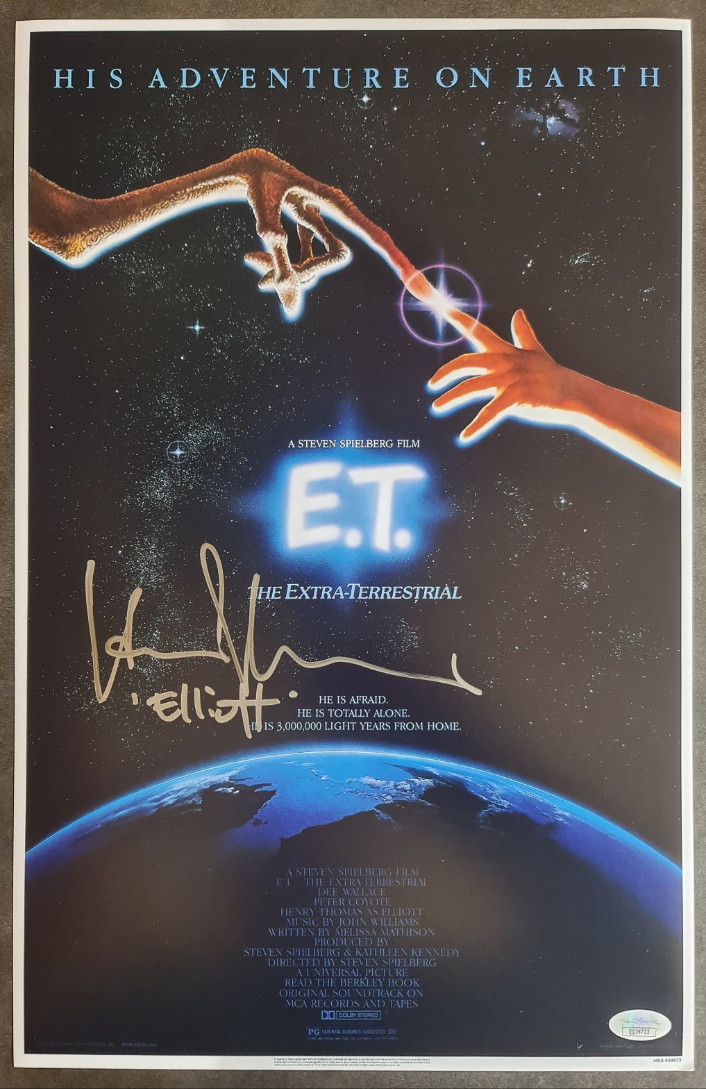 E.T. L'extraterrestre poster signé par Henry Thomas JSA
