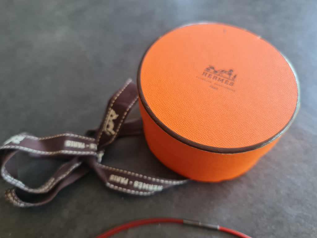 Collier et pendentif Hermès orange