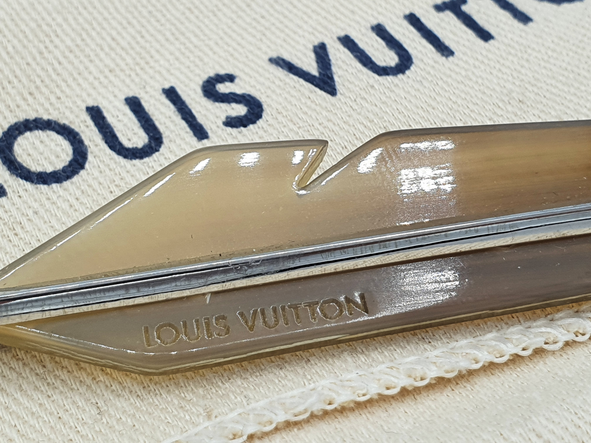 Broche plume Louis Vuitton