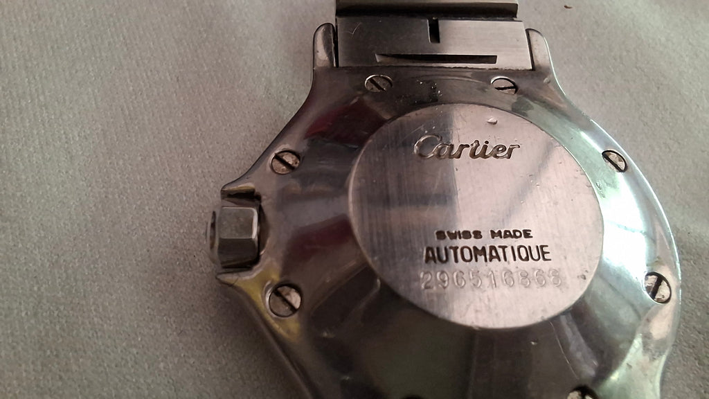 Montre Cartier Santos automatique avec écrin et garantie. Collection Must de Cartier